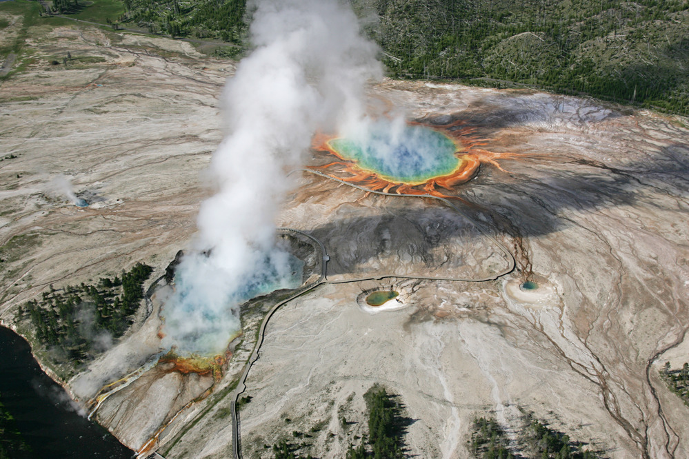 Aerial view of Excelsior Geyser and Grand Prismatic Spring in Midway Geyser Basin